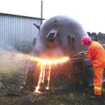 In 2006, the owner of DARK METALS demonstrated the new lancing equipment on an oversized cast steel ladle providing its' efficiently
